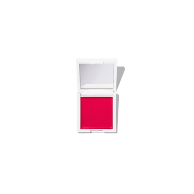 TRU SKN Radiant Glow Cream Blush in Deep Pink. The compact shows the creamy formula that melts into skin, leaving a fresh, dewy, and luminous finish.