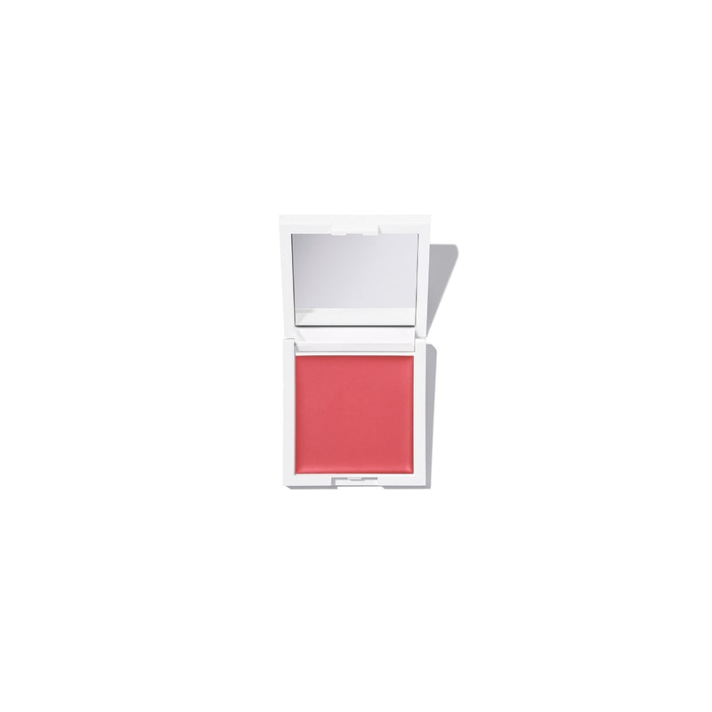 TRU SKN Radiant Glow Cream Blush in Bare Pink. The compact shows the creamy formula that melts into skin, leaving a fresh, dewy, and luminous finish.